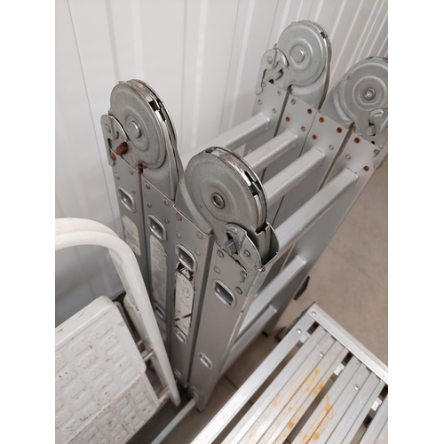 44 - A collection of ladders to include two sets of steps, a platform and a 3 metre foldable ladder.