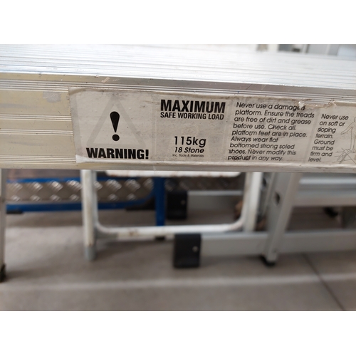 44 - A collection of ladders to include two sets of steps, a platform and a 3 metre foldable ladder.