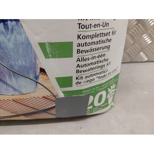 46 - A hozelock deluxe auto kit together with hose reel and sprinkler attachment. All appears present in ... 