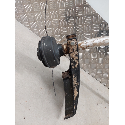 48 - Qualcast petrol Strimmer. Appears complete. Untested as no petrol.
