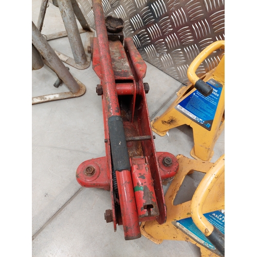 52 - A vintage trolley jack possibly 2 tonne, together with 2 pairs of axle stands.