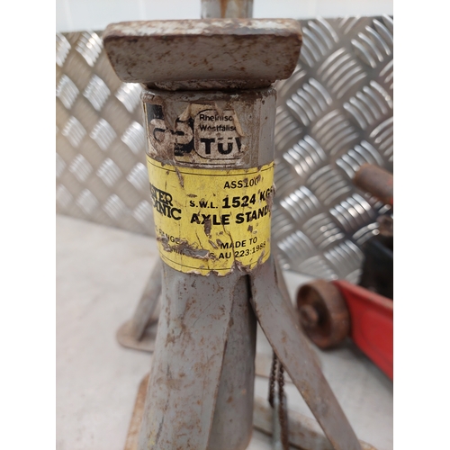 52 - A vintage trolley jack possibly 2 tonne, together with 2 pairs of axle stands.