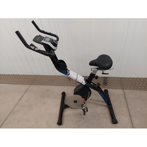55 - An exerpeutic folding upright exercise bike with pulse. Appears to have had very light usage.