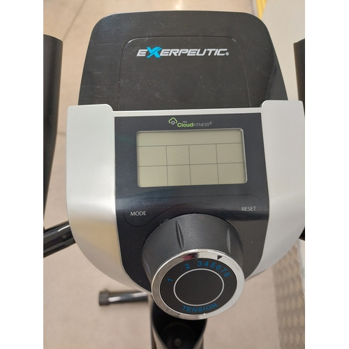 55 - An exerpeutic folding upright exercise bike with pulse. Appears to have had very light usage.
