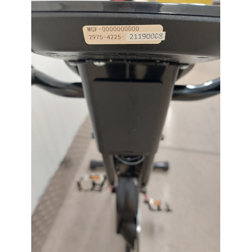 55 - An exerpeutic folding upright exercise bike with pulse. Appears to have had very light usage.