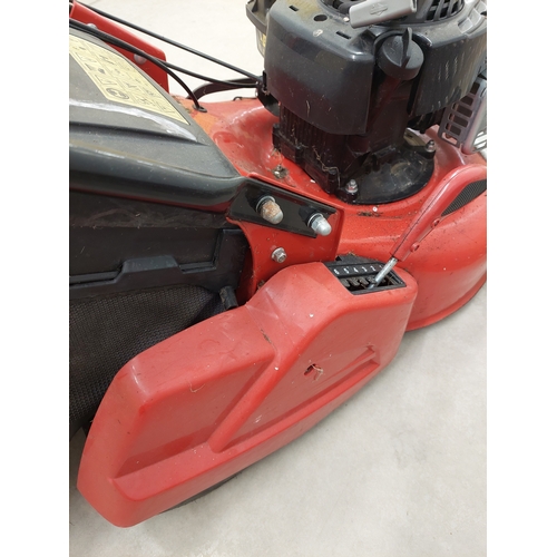 56 - A cobra lawn mower with briggs & Stratton 500e series 140cc petrol engine. Good overall condition.