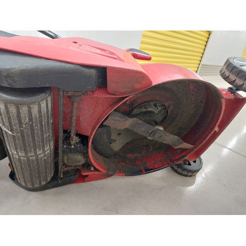 56 - A cobra lawn mower with briggs & Stratton 500e series 140cc petrol engine. Good overall condition.