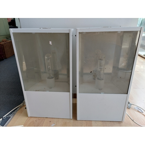 58 - A pair of industrial warehouse light units. One pat tested and working, the other will need rewiring... 
