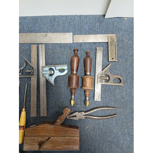 60 - A collection of carpentry tools to include 2 planes, chisels and more.