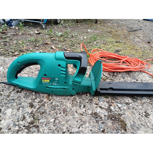 61 - A Bosch AHS 3 corded electric hedge trimmer. Pat tested and Working and in its original box.