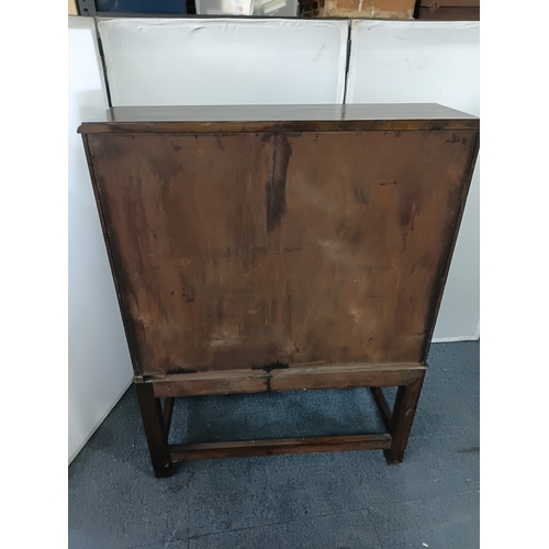 146 - An antique solid oak writing bureau, with fall front writing surface and 2 drawers. Height 40.5inche... 