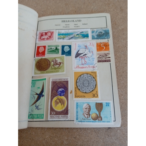 204 - A large collection of various vintage stamps, both in albums and loose - albums contain stamps from ... 