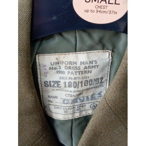 206 - A collection of vintage military uniforms, to include; a British Army No. 2 Dress jacket, a German 