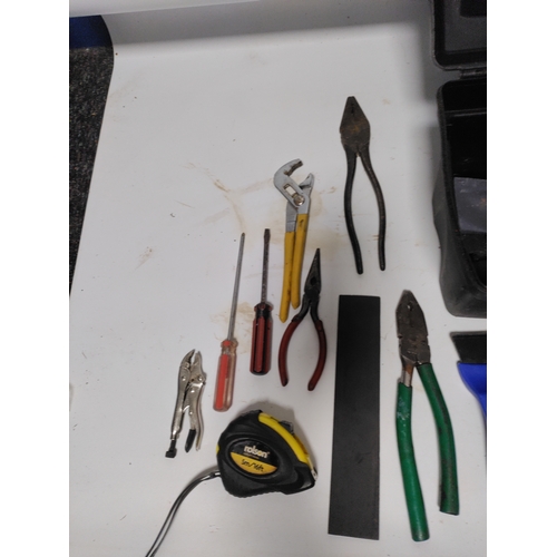 65 - A large collection of tools to include Stanley knifes, screwdrivers, scrapers, a hammer, pliers and ... 
