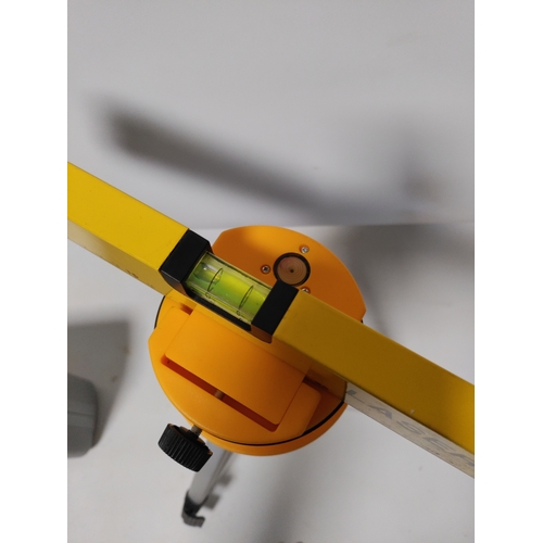 68 - A Workpro heat gun in it's original protective film and a laser level kit with and adjustable tripod... 