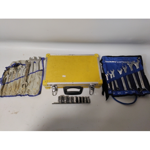 70 - 2 spanner sets and a socket set with a yellow hard shell case. Height 3.5 inches x width 15.5 inches... 