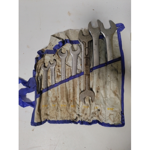 70 - 2 spanner sets and a socket set with a yellow hard shell case. Height 3.5 inches x width 15.5 inches... 