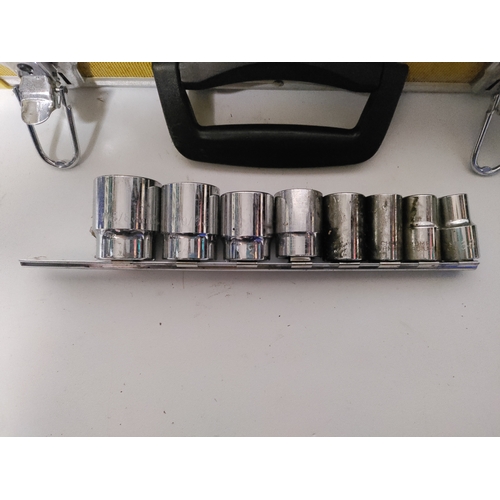 70 - 2 spanner sets and a socket set with a yellow hard shell case. Height 3.5 inches x width 15.5 inches... 