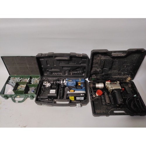 72 - A battery operated SDS drill, a cabled SDS drill and a box full of screws both PAT tested and workin... 