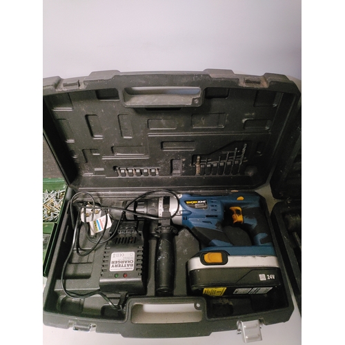72 - A battery operated SDS drill, a cabled SDS drill and a box full of screws both PAT tested and workin... 