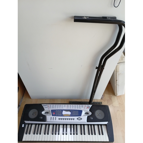 75 - A Maxim 25-98 54-key digital electronic keyboard tested and working, with keyboard stand