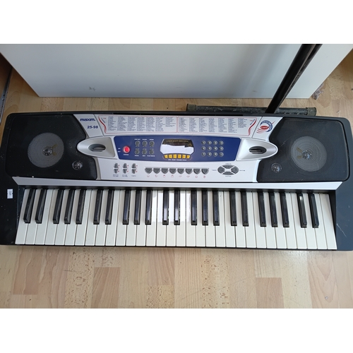 75 - A Maxim 25-98 54-key digital electronic keyboard tested and working, with keyboard stand