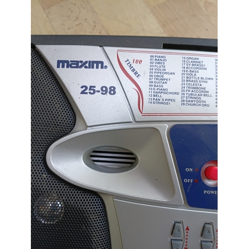 75 - A Maxim 25-98 54-key digital electronic keyboard tested and working, with keyboard stand