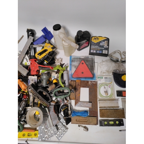 76 - A collection of tools to include clamps, screwdrivers, building squares and more.