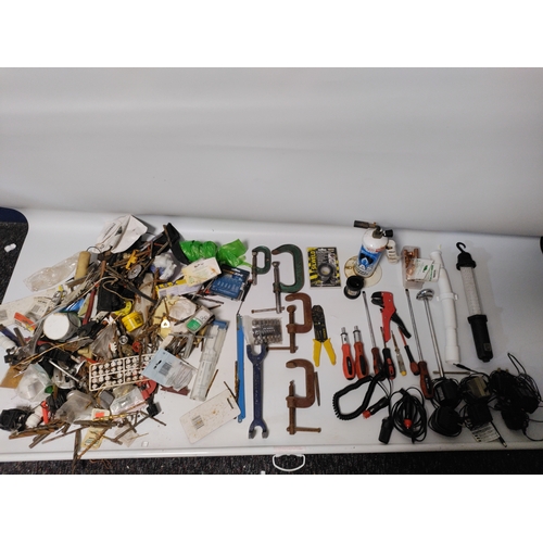 77 - A large collection of tools to include, screwdrivers, clamps, spanners, drill bits and more.