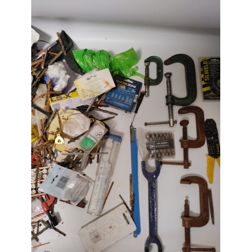 77 - A large collection of tools to include, screwdrivers, clamps, spanners, drill bits and more.