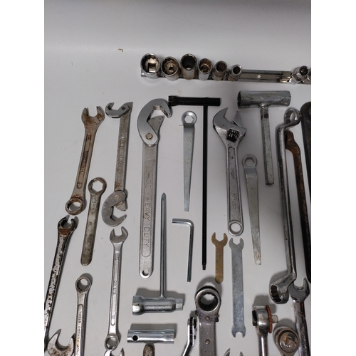 78 - A large collection of spanners , sockets and wrenches.