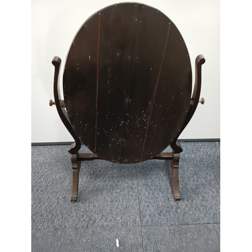 105 - An antique oak swing dressing table mirror, height 22inches x width 16inches