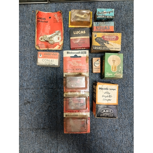 85 - A vintage workshop parts organizer cabinet full of bulbs. Height 12 inches x width 18.5 inches.
