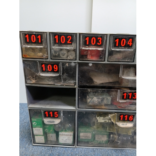 85 - A vintage workshop parts organizer cabinet full of bulbs. Height 12 inches x width 18.5 inches.