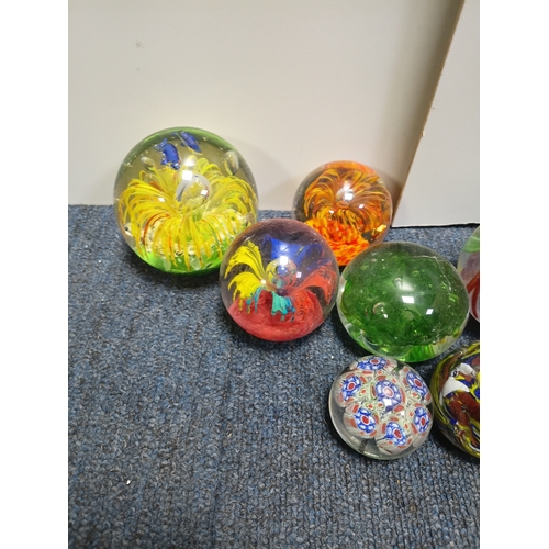 250 - A collection of 19 paper weights, all different sizes and shapes, the largest one measures diameter ... 
