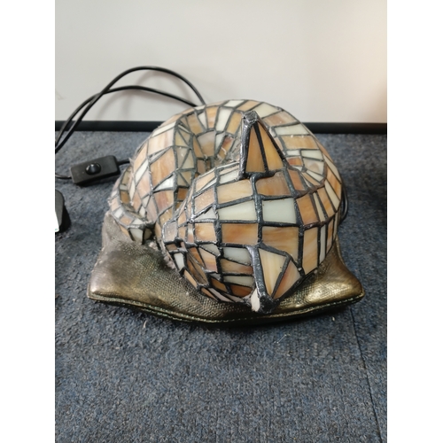 253 - A Tiffany-style stained glass cat accent lamp, with a wicker basket, pat tested but doesn't light up... 