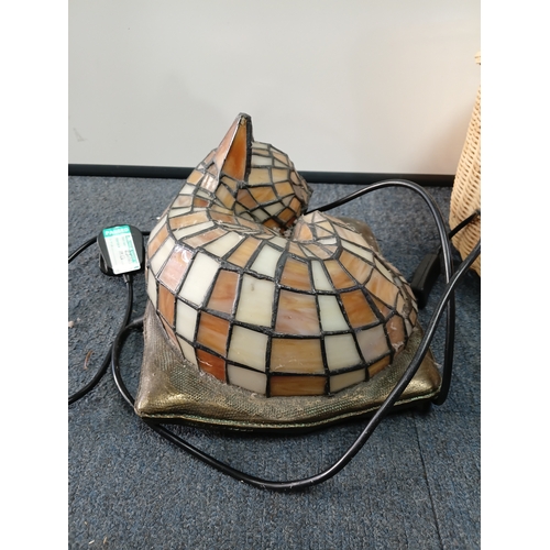 253 - A Tiffany-style stained glass cat accent lamp, with a wicker basket, pat tested but doesn't light up... 