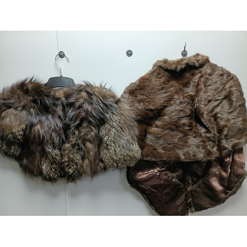 255 - A pair of vintage brown fur stoles with nylon backings