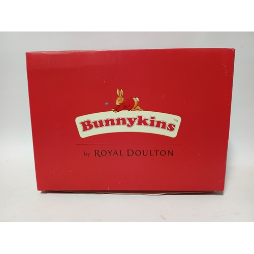 261 - A Royal Doulton Bunnykins display base from the Arthurian Legends collection, with certificate and i... 