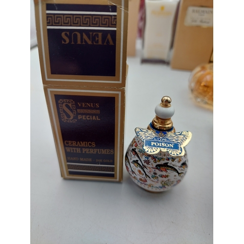 264 - A large collection of 24 designer perfumes mostly full and some still sealed. Brands to include, Cha... 