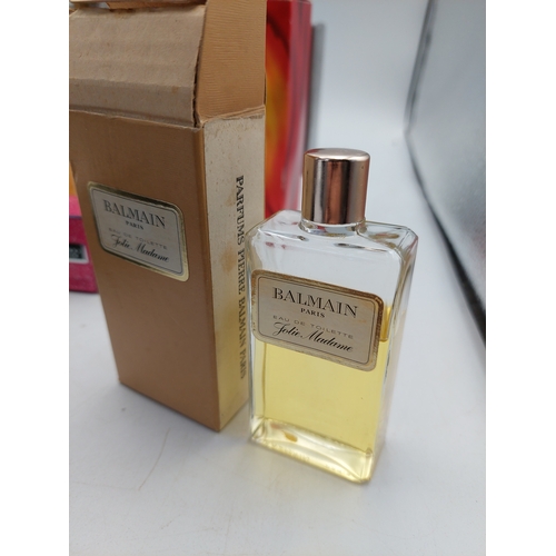 264 - A large collection of 24 designer perfumes mostly full and some still sealed. Brands to include, Cha... 