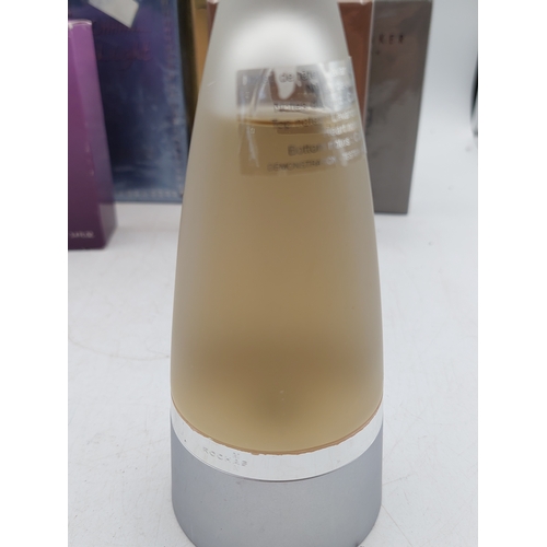 264 - A large collection of 24 designer perfumes mostly full and some still sealed. Brands to include, Cha... 