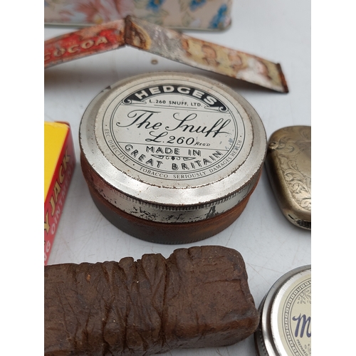 216 - A collection of vintage items, mostly snuff related. To include enamelled snuff tin, vesta case, Fry... 