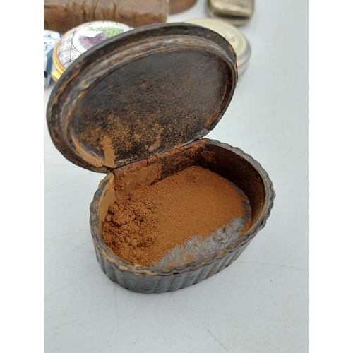216 - A collection of vintage items, mostly snuff related. To include enamelled snuff tin, vesta case, Fry... 
