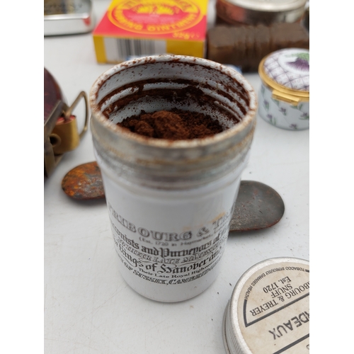 216 - A collection of vintage items, mostly snuff related. To include enamelled snuff tin, vesta case, Fry... 