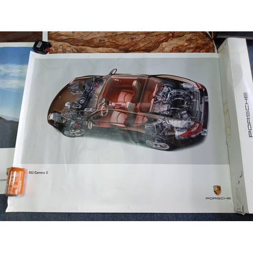 217 - A job lot of posters, to include; 3x genuine PORSCHE 911 posters (100cm x 75cm), an aboriginal style... 