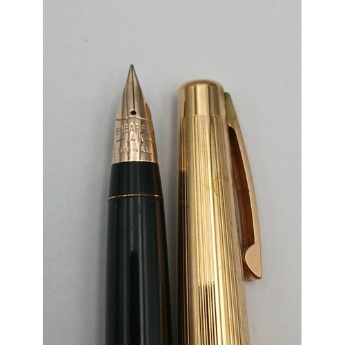 220 - A vintage sheafer fountain pen with a 14k gold nib.
