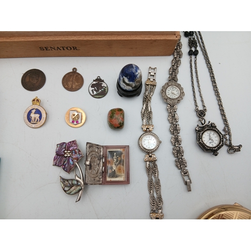 222 - A collection of jewellery in a Corps Diplomatique cigar box. Jewellery includes, watches, brooches, ... 