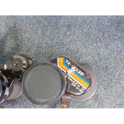 223 - A collection of vintage binoculars, to include; 