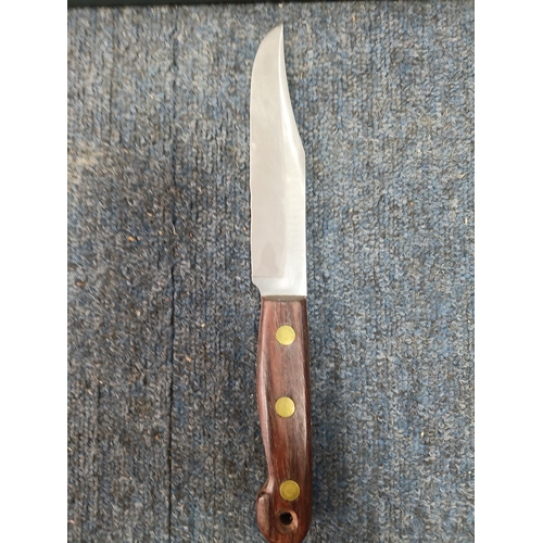 225 - A Sam brown belt with a magazine pouch, a West German commando knife, and 2 other knives in sheaths.